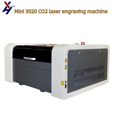 लकड़ी के एक्रिलिक चमड़े के कपड़े के लिए 300*200 मिमी CO2 लेजर उत्कीर्णक M2 रुइडा