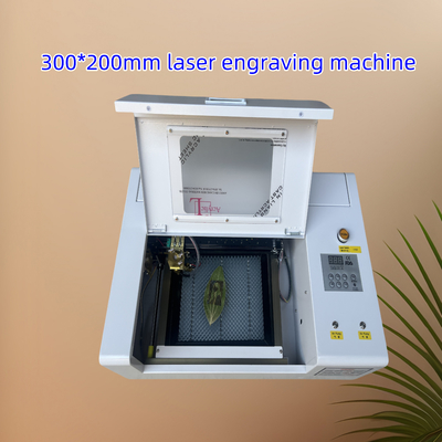 3020 300*200mm सीएनसी CO2 लेजर उत्कीर्णक एक्रिलिक लकड़ी चमड़ा कपड़ा के लिए
